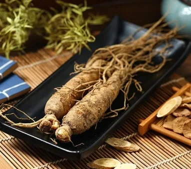 Whole ginseng roots on a dark tray, brand image shown for the ginseng page